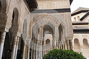 Beautiful ancient islamic architecture style details an arc and columns into lions yard