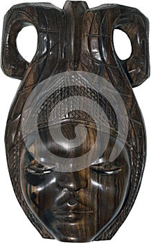 Beautiful ancient wooden mahogany mask represent female human face with decorations and  buffalo horns