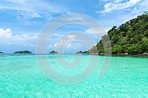Beautiful Andaman sea, Tropical Turquoise clear blue sea and white sand beach on pattaya beach with blue sky background - summer