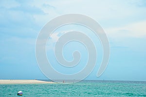 Beautiful Andaman sea, Tropical Turquoise clear blue sea and white sand beach on pattaya beach with blue sky background - summer