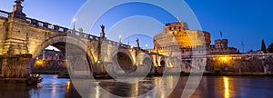 Beautiful Angels bridge and castle in evening illumination, Rome, Italy