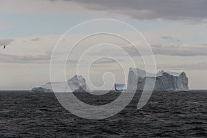 Beautiful antarctic landscape with iceberg and mountains