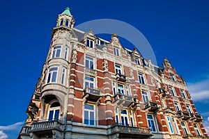 Beautiful antique building at the Old Central district of Amsterdam