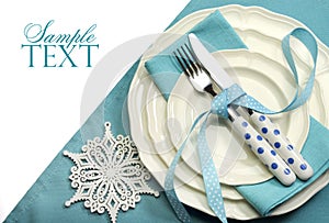 Beautiful aqua blue festive Christmas dining table place setting