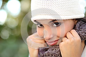 Beautiful arab woman portrait warmly clothed photo