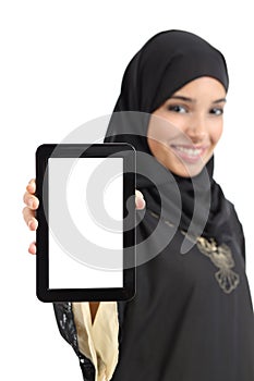 Beautiful arab woman showing a blank vertical tablet screen isolated