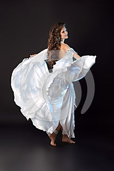 Beautiful Arabian bellydancer woman in bellydance white cos