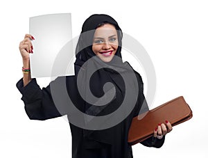 Beautiful Arabian woman holding a folder isolated on white