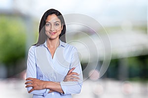 Beautiful arabic businesswoman with crossed arms