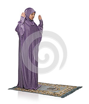 Beautiful Arabic Girl Praying Wearing Muslim Clothes, Arms Raised