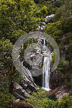 The beautiful Arado Waterfall Cascata do Arado at the Peneda Geres National Park in northern Portuga photo