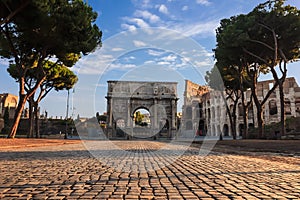 Beautiful Arch of Constantine and Colosseum summer view in Rome