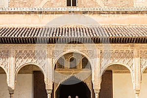 Arches of the courtyard of Comares patio in Alhambra, Granada, Spain photo