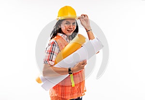 a beautiful architect standing touch her hardhat and bring the paperworks