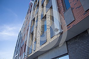 Beautiful architectural building against the blue sky close-up 1