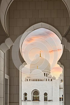 Beautiful architecture of the Grand Mosque in Abu Dhabi at sunset, United Arab Emirates
