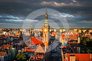 Beautiful architecture of the Main Town Hall of Gdansk in the rays of the setting sun. Poland