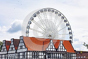 Beautiful architecture of the old city. Gdansk, Poland. European architecture. Ferris wheel.