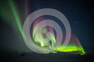 Beautiful Arctic mountain landscape with Northern Lights - Spitsbergen, Svalbard