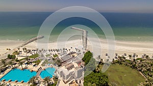 Beautiful area of beach in Ajman timelapse near the turquoise waters of Arabian Gulf. photo