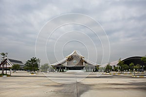 Beautiful art ubosot ordination hall building for thai people travel visit respect praying blessing buddha at Wat Buddha Saeng