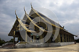 Beautiful art ubosot ordination hall building for thai people travel visit respect praying blessing buddha at Wat Buddha Saeng