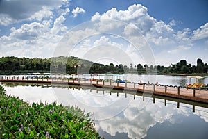 Beautiful artificial lake with a wood path