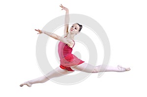 Beautiful artistic female ballerina working out, performing ballet element