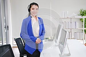 beautiful asia woman working call center operator with headset in office or workplace