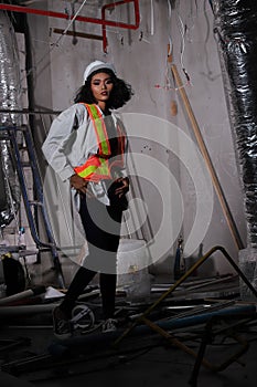 Beautiful Asian Architect Engineer woman in white hard hat