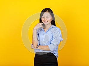 Beautiful Asian business woman secretary on smart executive dress style of long sleeve shirt smile and happy to relax by putting