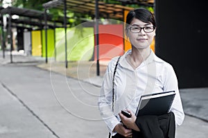 Beautiful Asian business woman in shopping mall.