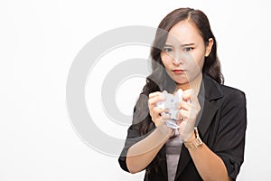 Beautiful Asian business woman wearing black suit. Angry woman crumples documents and stress  on white background and copy space