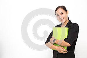Beautiful Asian business woman wearing black suit holding document folder smiling on  white background and copy space. Confident