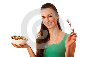 Beautiful asian caucasian woman with a white bowl of mixed salad