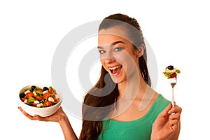 Beautiful asian caucasian woman with a white bowl of mixed salad