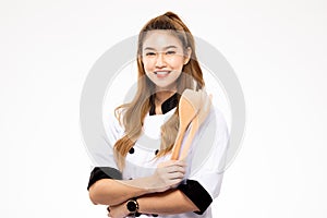 Beautiful Asian chef woman smile and holding wooden Spatula and fork isolated on white background