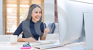 Beautiful asian girl celebrate with laptop computer. Success happy pose. E-commerce. University education. Internet technology. St