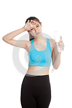 Beautiful Asian healthy girl with bottle of drinking water