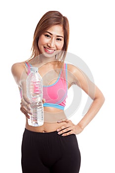 Beautiful Asian healthy girl with bottle of drinking water