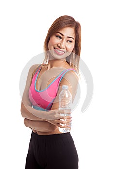 Beautiful Asian healthy girl with bottle of drinking water