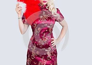 Beautiful Asian model wearing traditional Cheongsam