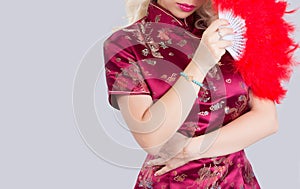 Beautiful Asian model wearing traditional Cheongsam