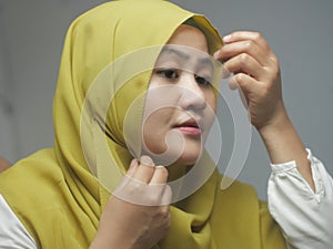 Beautiful Asian muslim woman wearing hijab on, head scarf for muslim woman, islamic religion concept