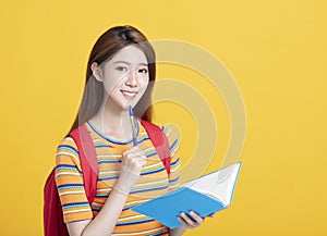 beautiful asian  student studying and thinking