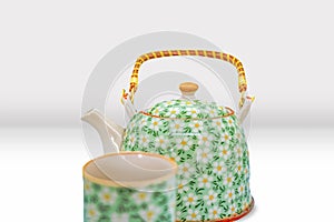 Beautiful Asian Tea Pot and Cup Set with Floral patterns Mockup