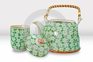 Beautiful Asian Tea Pot and Cup Set with Floral patterns Mockup