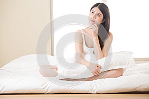 Beautiful asian woman daze and thinking in the morning