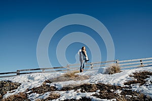 Beautiful asian woman enjoy view with snow during winter in New Zealand