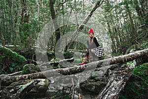 Beautiful asian woman enjoy view with snow during winter in New Zealand.